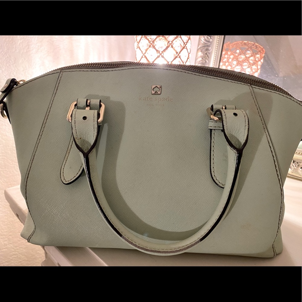 Mint blue Kate Spade purse.